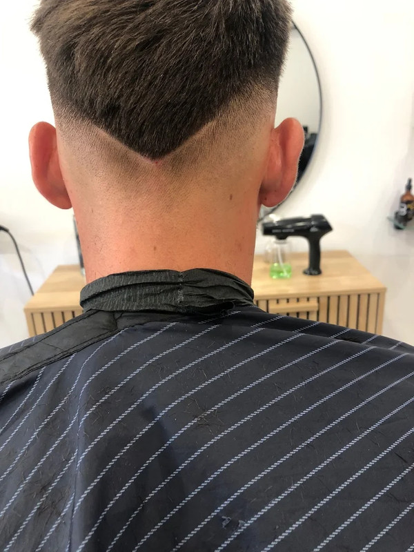 Salón de Belleza y Barbería 21-13 5